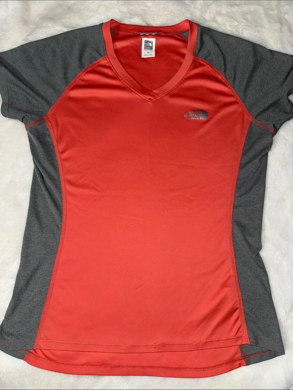 The North Face Red V-Neck Short Sleeve Performance Tee with Gray Panels - Picture 1 of 3
